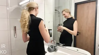 A girl in a black dress is getting ready for a party in the bathroom | Irina Kovych #3