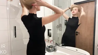 A girl in a black dress is getting ready for a party in the bathroom | Irina Kovych #5