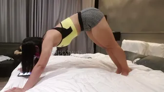 Asian Goddess Stretches before work