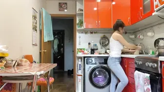 Cleaning routine kitchen and hallway in blue jeans and white top #5