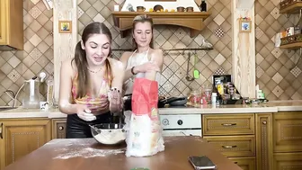 Vacuuming flour from each other while cleaning #2