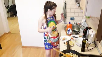 Cooking chicken and eggs in an apron #2