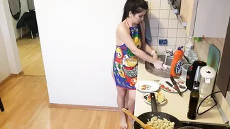 Cooking chicken and eggs in an apron #3