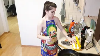 Cooking chicken and eggs in an apron #5