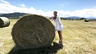 Girl in short dress on hay lifts long legs | good mood of girl | motivational video in nature #2