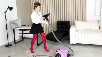 Secretary vacuums office after party #2