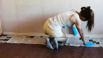 Painting the baseboard in blue latex gloves #3