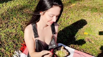 Polina has breakfast in nature