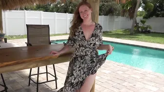 green floral wrap dress by pool #4