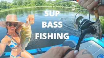 CATCHING A LARGEMOUTH BASS WHILE PADDLEBOARDING