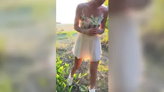 A delicate girl in transparent short skirt with flowers #3