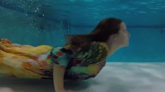 Swim underwater in the rainbow dress